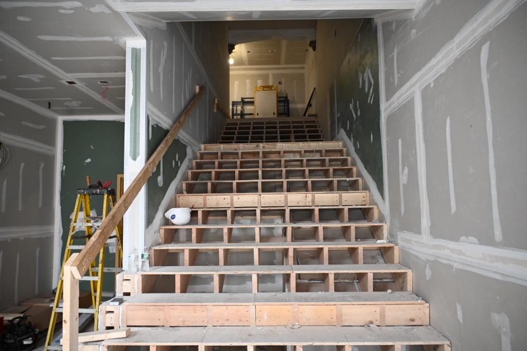 The stairs leading up to the third floor of Johnson Hall.